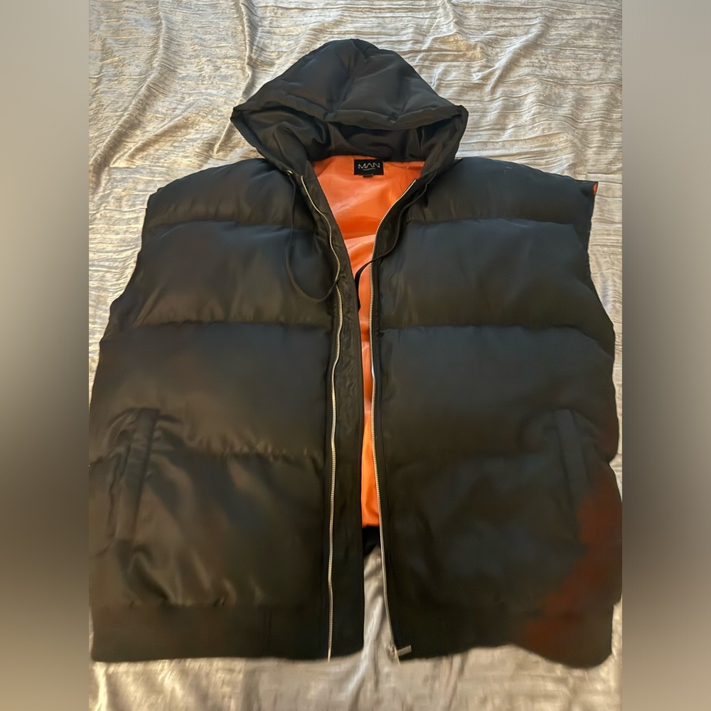 Boohoo man black bomber vest in a size large